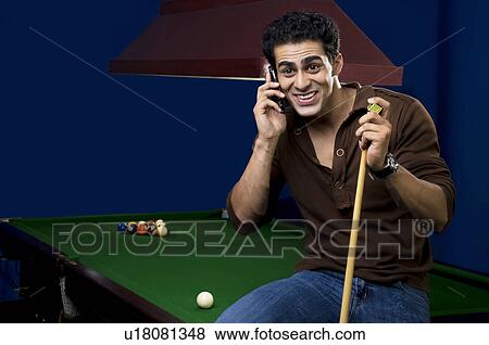 Man talking on his cell phone View Large Photo Image Stock Photo - Man talking on his cell phone. Fotosearch