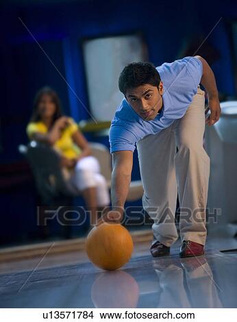 Man with a bowling ball View Large Photo Image Picture - Man with a bowling ball. Fotosearch