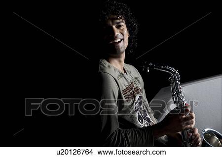 Picture - Man with a saxophone. Fotosearch