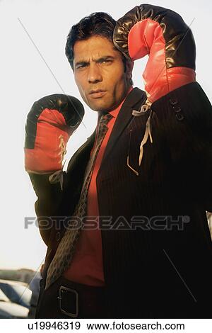 Stock Photo - Man with boxing gloves. Fotosearch
