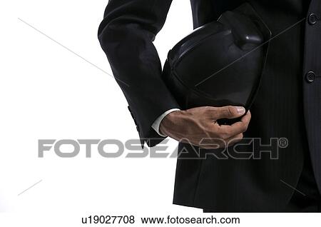 Stock Photo - Man with helmet. Fotosearch