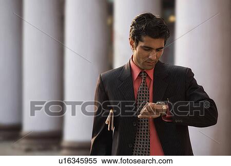 Stock Photography - Man with newspaper. Fotosearch