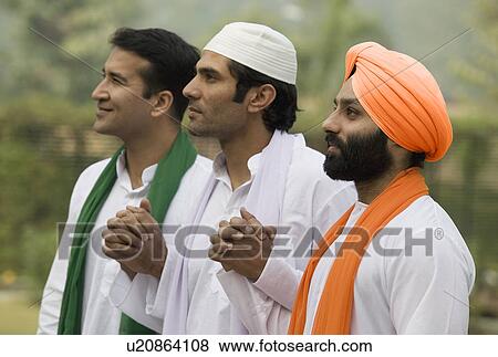 Stock Photo - Men holding hands. Fotosearch