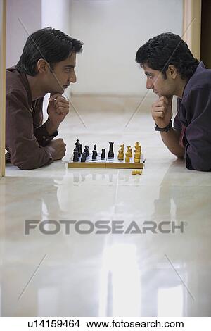 Men playing chess View Large Photo Image Picture - Men playing chess. Fotosearch