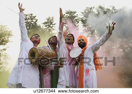 Men playing Holi View Large Photo Image Picture - Men playing Holi. Fotosearch