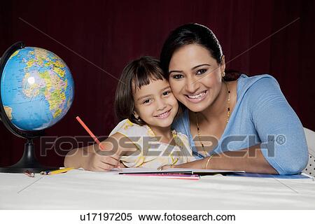 Stock Photography - Mother and Daughter smiling. Fotosearch