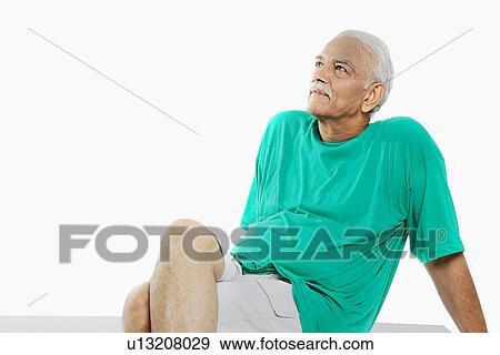 Stock Photo - Old man relaxing. Fotosearch