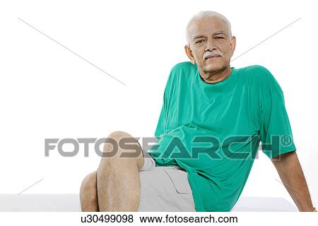 Stock Photo - Old man relaxing. Fotosearch