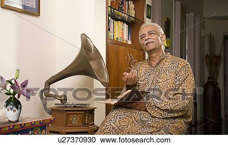 Stock Image - Old man thinking. Fotosearch
