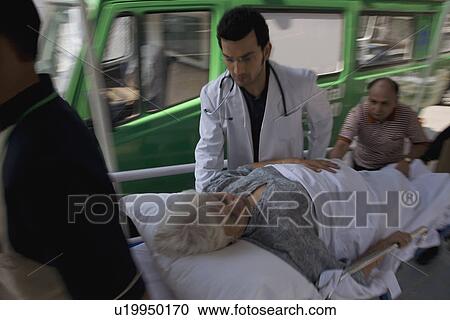 Stock Image - Patient rushed to the ER. Fotosearch