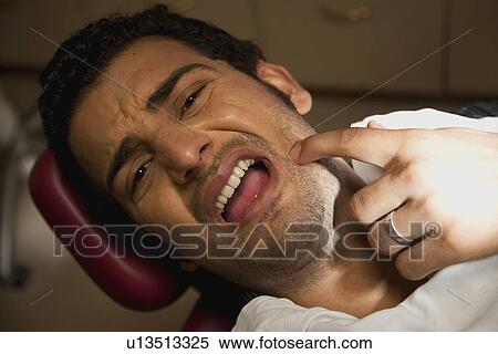 Patient with a toothache View Large Photo Image Stock Photography - Patient with a toothache. Fotosearch