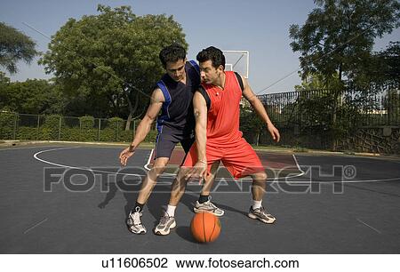 Playing basketball View Large Photo Image Stock Image - Playing basketball. Fotosearch