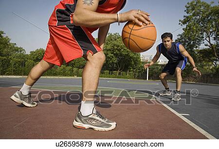 Playing basketball View Large Photo Image Stock Photo - Playing basketball. Fotosearch