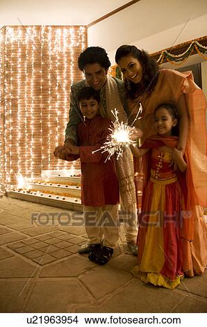 Playing with firecrackers View Large Photo Image Picture - Playing with firecrackers. Fotosearch