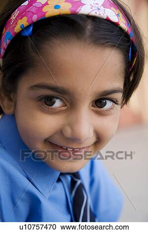 Stock Image - Portrait of a school girl. Fotosearch