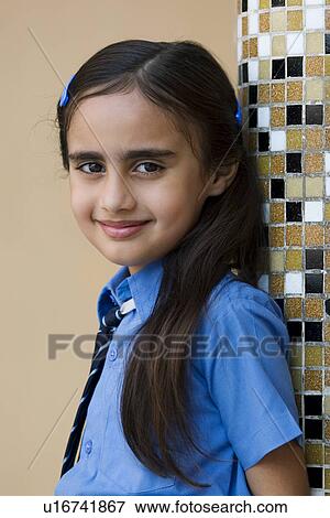 Stock Photo - Portrait of a school girl. Fotosearch