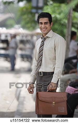Portrait of an executive View Large Photo Image Stock Image - Portrait of an executive. Fotosearch