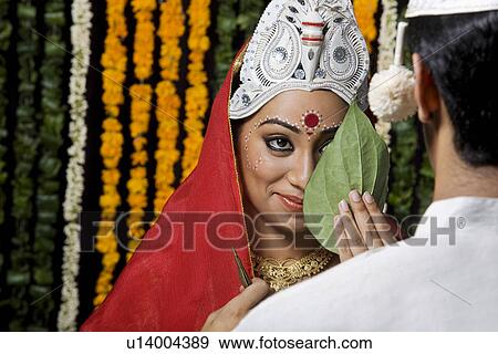 Portrait of an Indian bride and groom View Large Photo Image Stock Photo - Portrait of an Indian bride and groom. Fotosearch