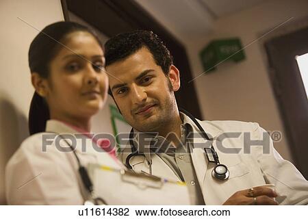 Stock Image - Portrait of doctors. Fotosearch