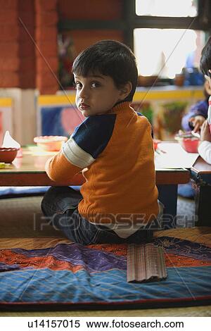 Stock Photography - Portrait of young boy. Fotosearch