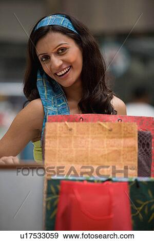 Stock Photo - Posing in a mall. Fotosearch