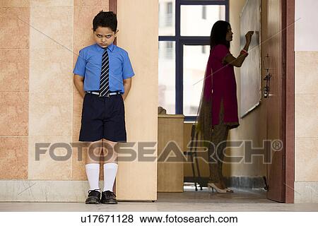 Punished school boy View Large Photo Image Stock Photo - Punished school boy. Fotosearch