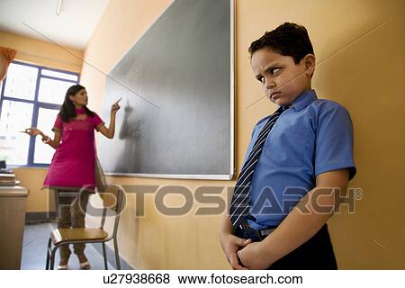 Punished school boy View Large Photo Image Stock Photo - Punished school boy. Fotosearch