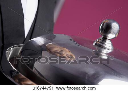 Reflection on service platter View Large Photo Image Stock Image - Reflection on service platter. Fotosearch