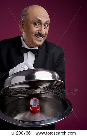 Ring in a serving platter View Large Photo Image Stock Image - Ring in a serving platter. Fotosearch