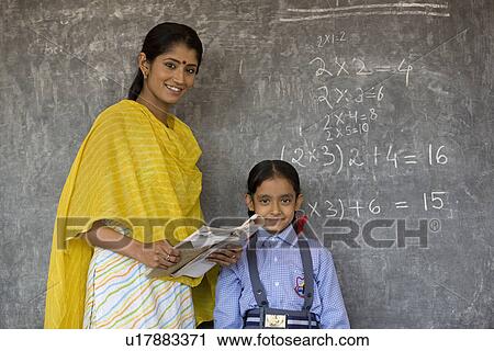 Stock Image - Rural student and teacher. Fotosearch