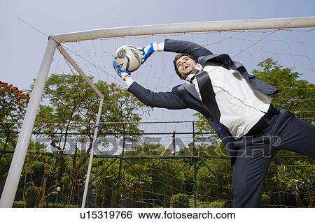 Stock Photograph - Saved a goal. Fotosearch