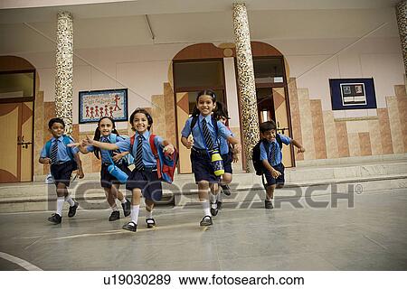 Stock Photo - School children running. Fotosearch