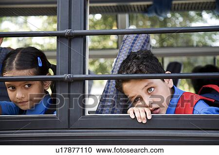 School children sitting in a school bus View Large Photo Image Stock Image - School children sitting in a school bus. Fotosearch