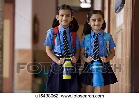 School girls walking together View Large Photo Image Stock Image - School girls walking together. Fotosearch