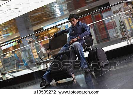 Sitting with luggage View Large Photo Image Stock Image - Sitting with luggage. Fotosearch