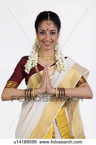 Stock Photo - South Indian woman greeting. Fotosearch