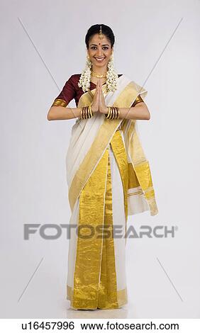 Stock Photograph - South Indian woman greeting. Fotosearch