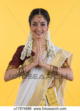 Stock Photograph - South Indian woman greeting. Fotosearch