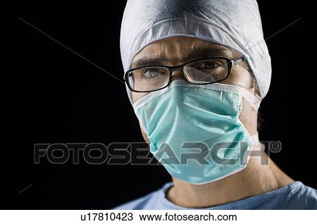 Surgeon looking View Large Photo Image Stock Image - Surgeon looking. Fotosearch