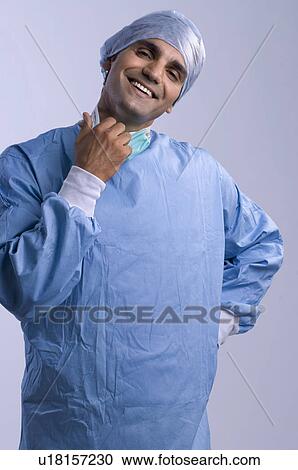Stock Image - Surgeon smiling. Fotosearch