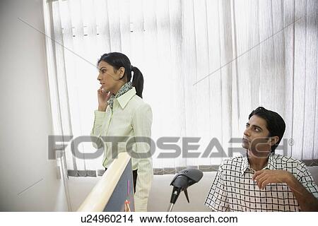Picture - Talking on the phone. Fotosearch