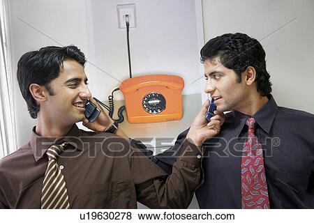 Stock Photo - Talking on the phone. Fotosearch