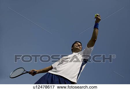 Tennis player about to serve View Large Photo Image Stock Photo - Tennis player about to serve. Fotosearch