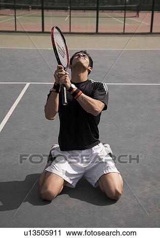 Tennis player disappointed View Large Photo Image Stock Image - Tennis player disappointed. Fotosearch