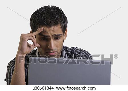 Picture - Tensed at work. Fotosearch