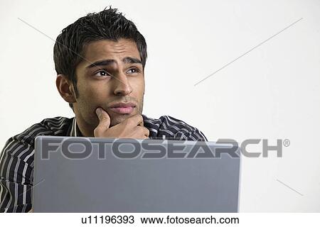 Stock Image - Tensed at work. Fotosearch