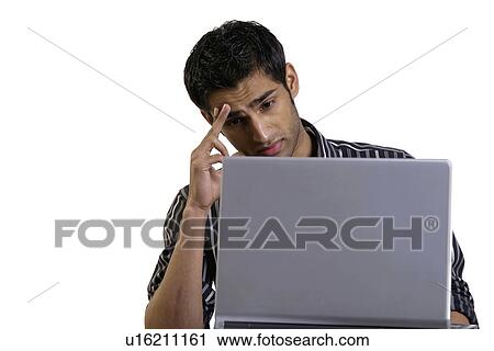 Stock Image - Tensed at work. Fotosearch