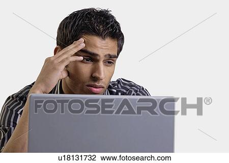 Stock Image - Tensed at work. Fotosearch