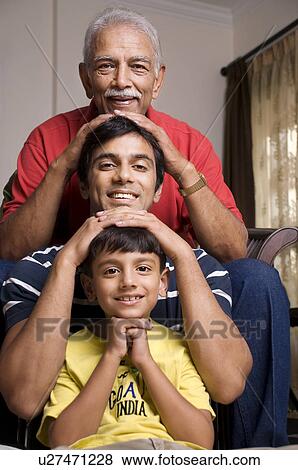 Three generations of a family View Large Photo Image Stock Photo - Three generations of a family. Fotosearch