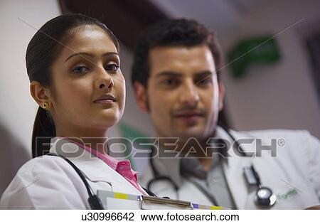 Stock Image - Two doctors. Fotosearch